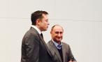 Elon Musk with Simon Galpin, Director-General of investHK